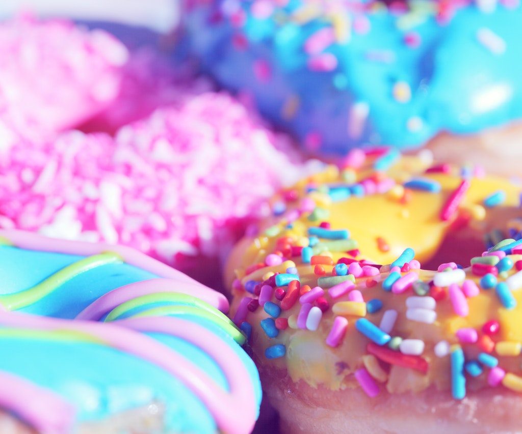 Frosted doughnuts with sprinkles