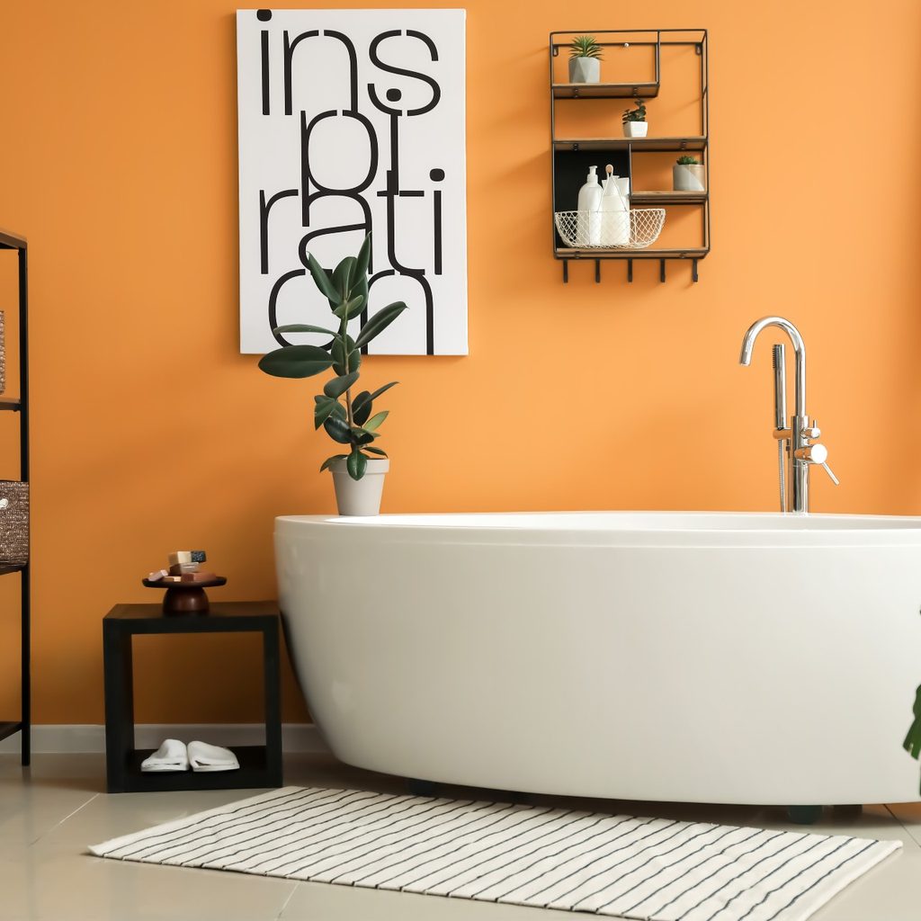 bathroom with orange walls