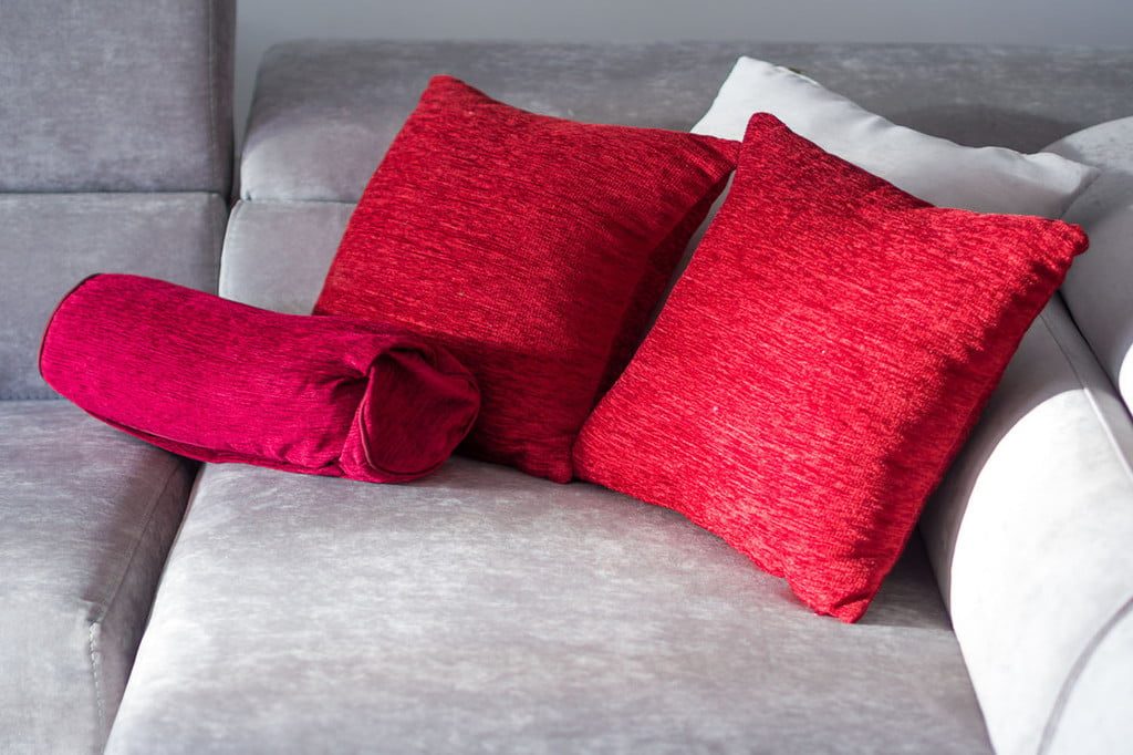 Red and magenta throw pillows