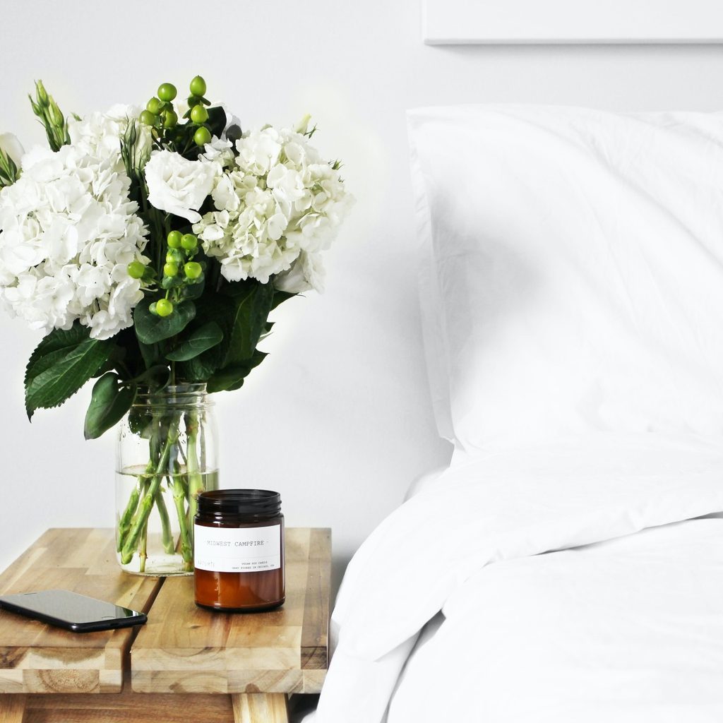 botanicals on a bedside table