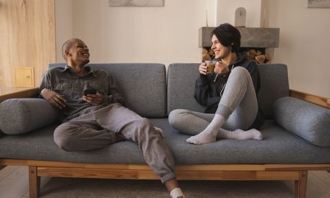 couple relaxing on couch