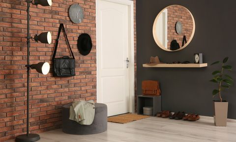 Entryway with round mirror