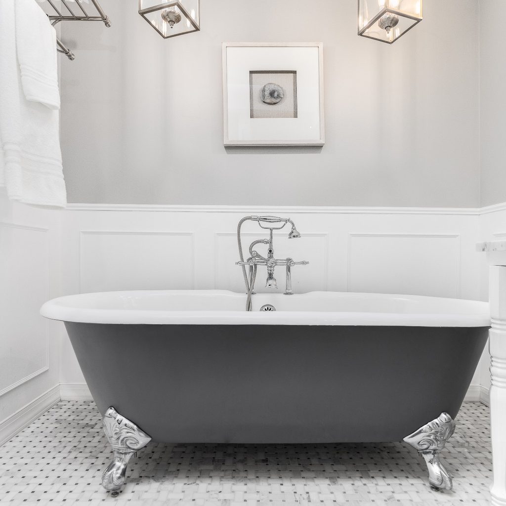 gray painted clawfoot tub