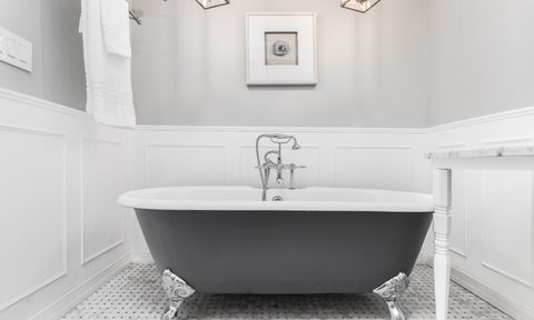 gray painted clawfoot tub