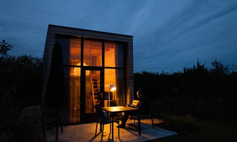 Tiny house at night