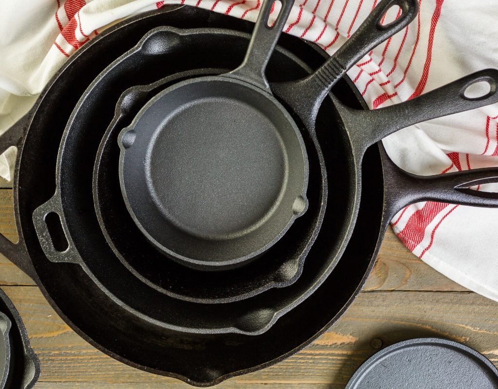 cast iron pans on table