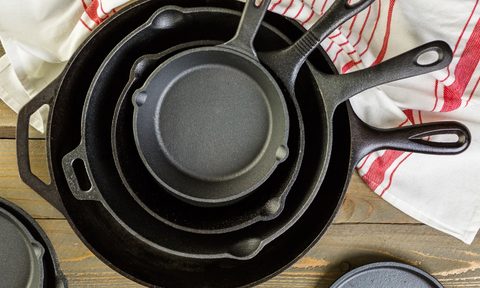 Cast iron pans on table