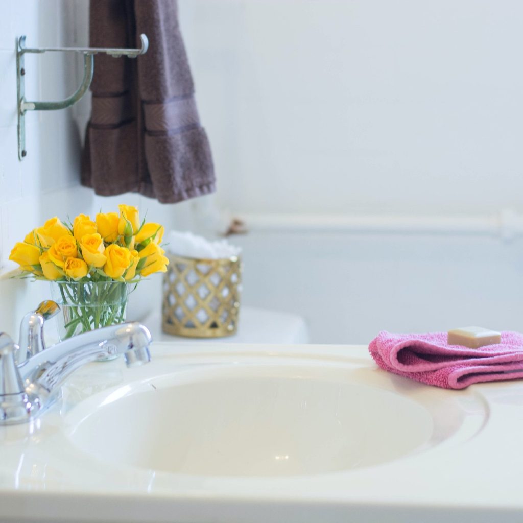 bathroom with yellow flowers