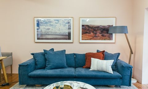 blue couch in clean living room