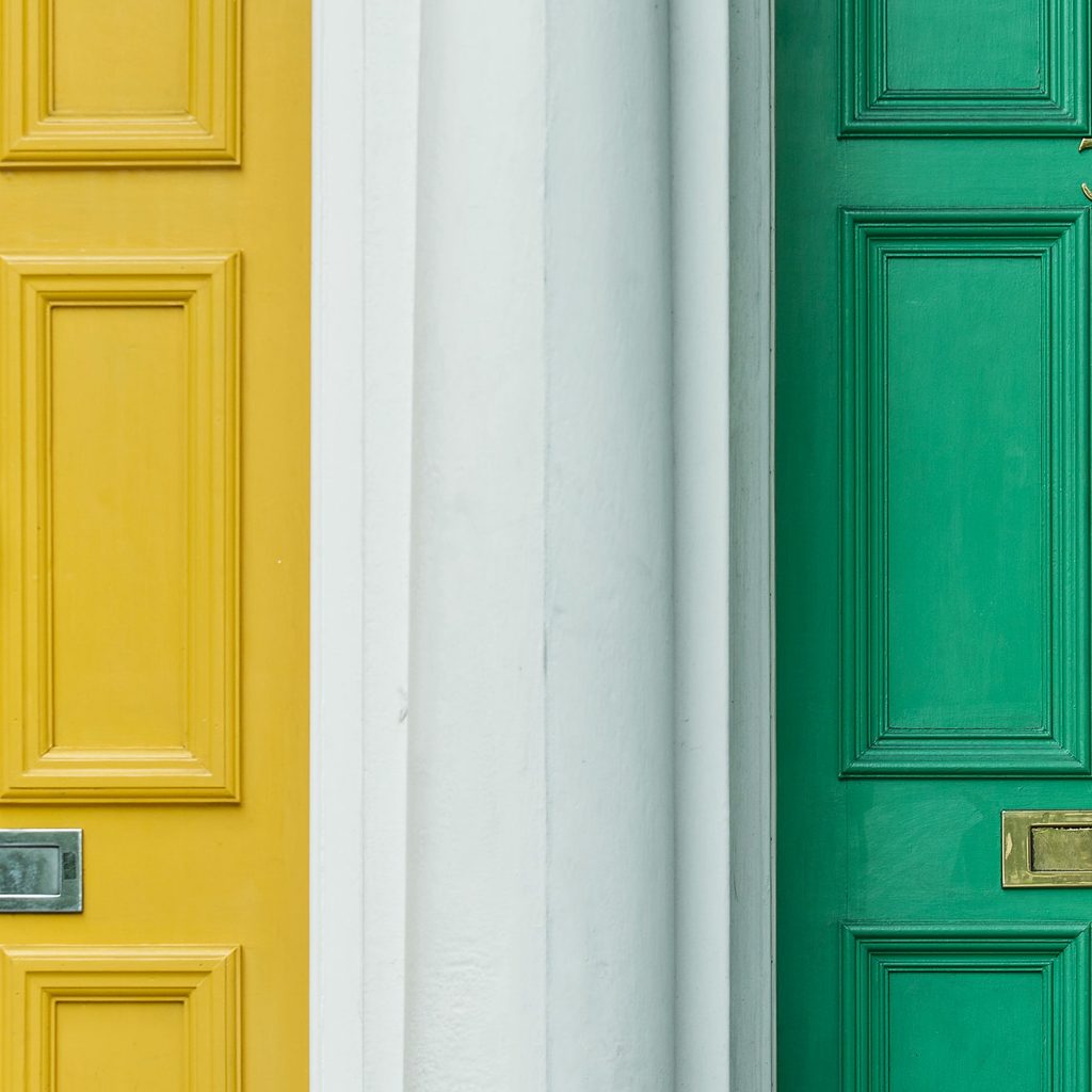green and yellow exterior door types next to each other