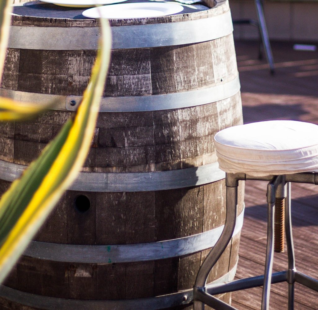 A wine barrel turned into a table.