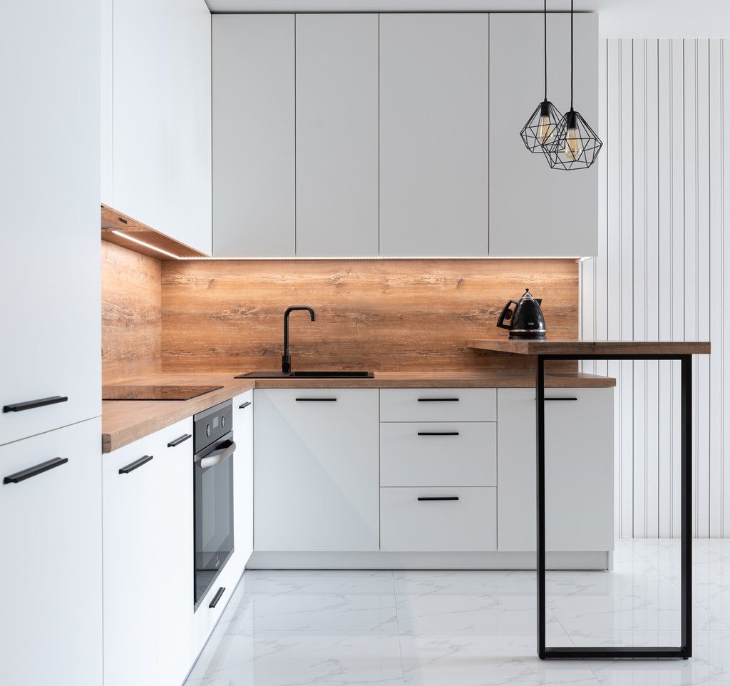 Kitchen with white cabinets and floor