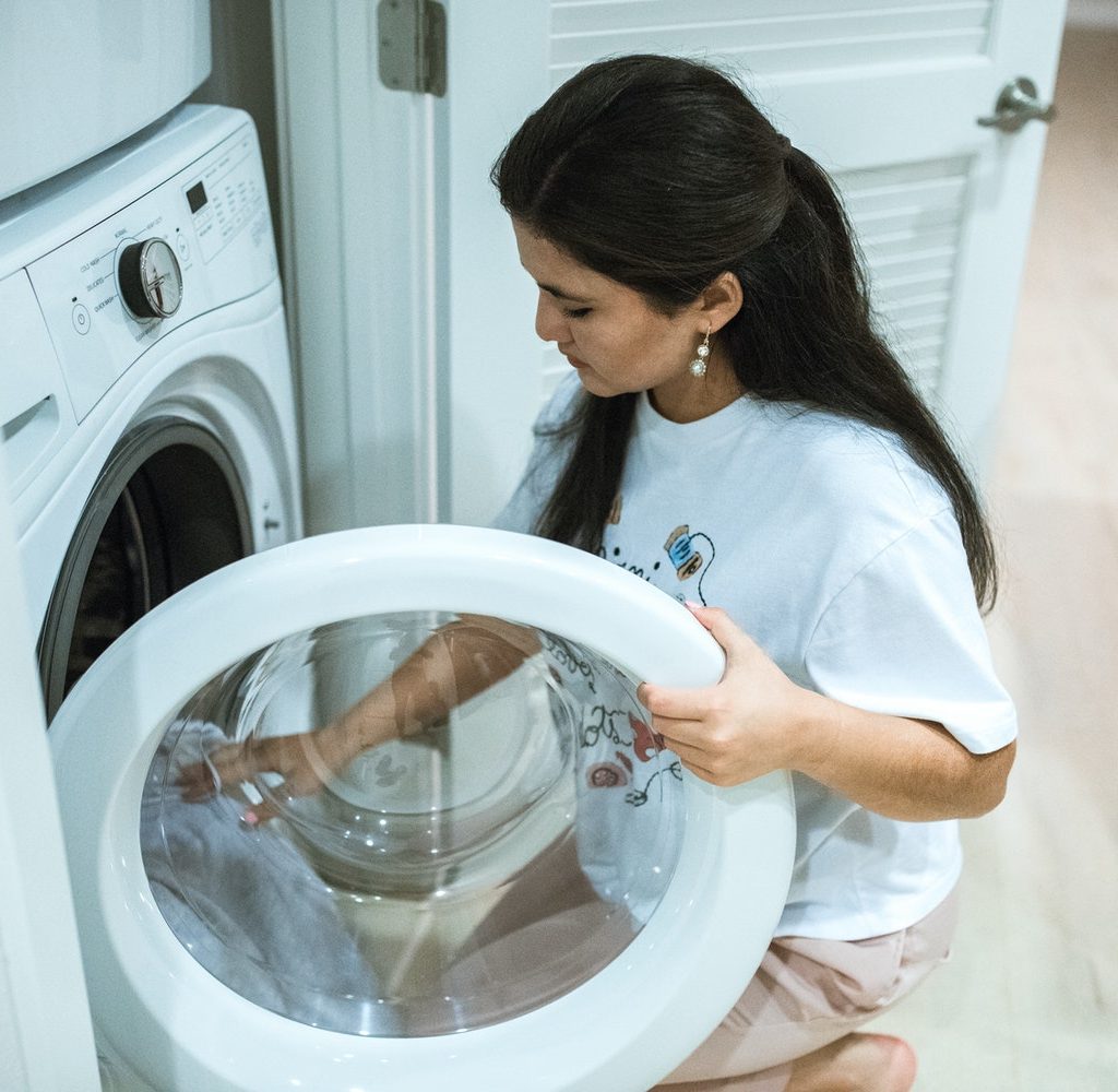 A woman doing the laundry.