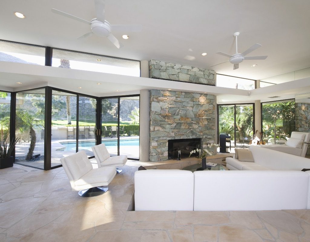 white-sunken-living-room-with-fireplace