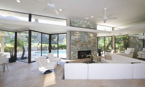 white-sunken-living-room-with-fireplace