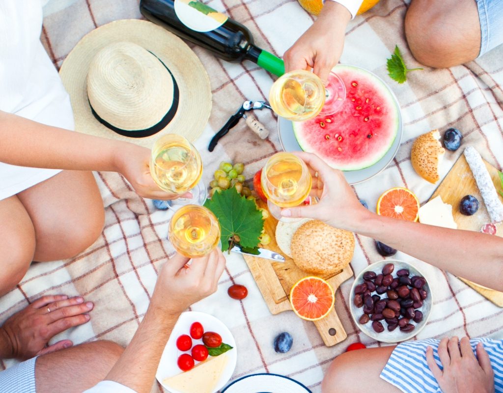 summer picnic party with fruits and drinks