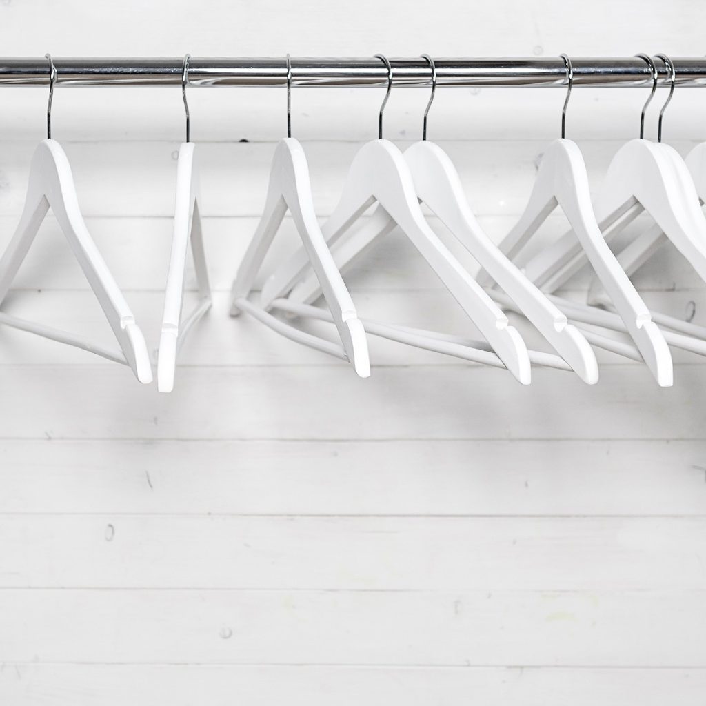 wooden hangers in a closet