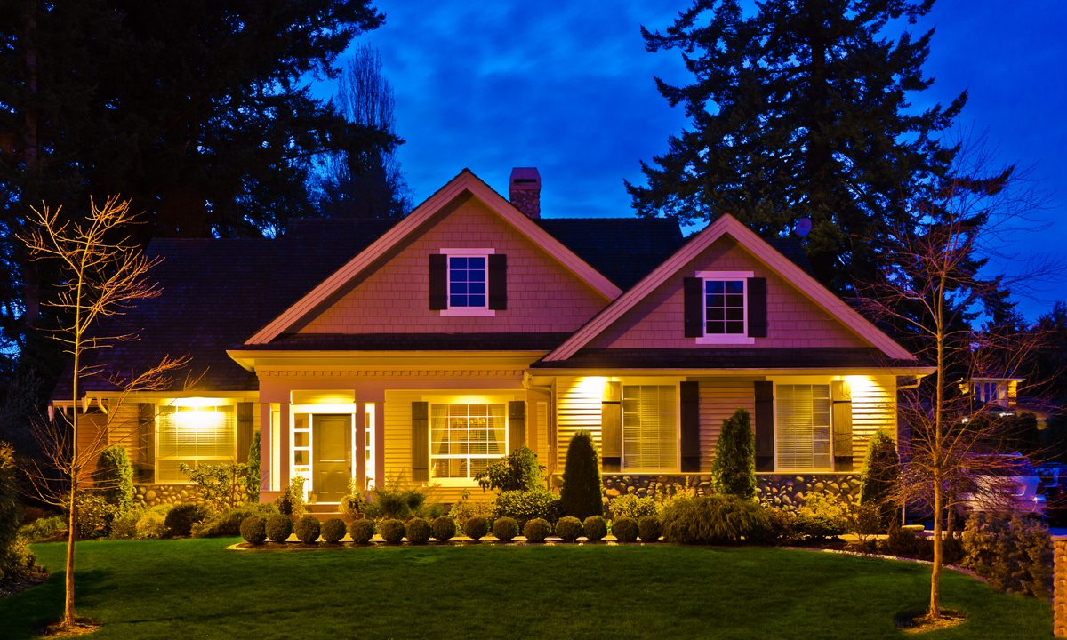 house with exterior lighting at dusk
