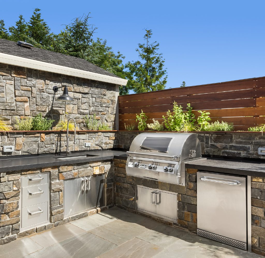 custom stone outdoor kitchen design