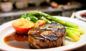 grilled steak with asparagus and gravy