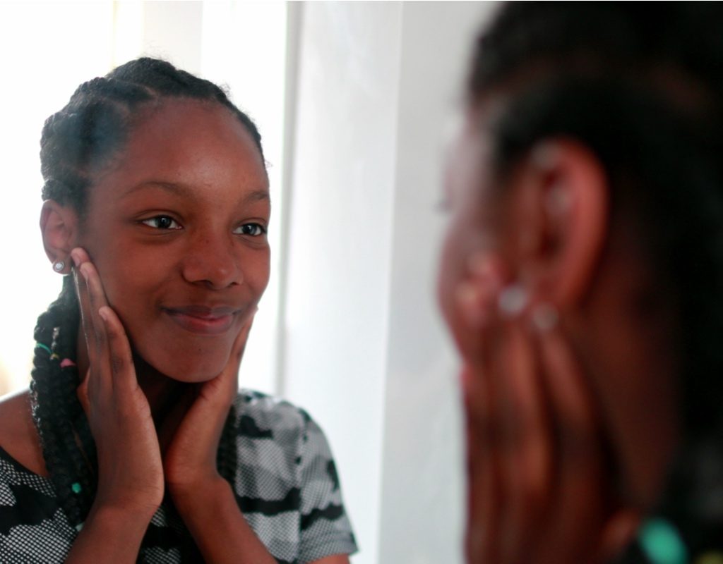 Young woman doing skin care