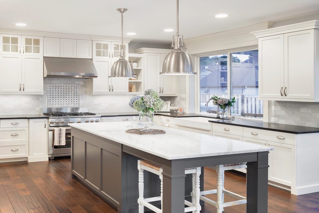 Luxury home with gray and white kitchen island