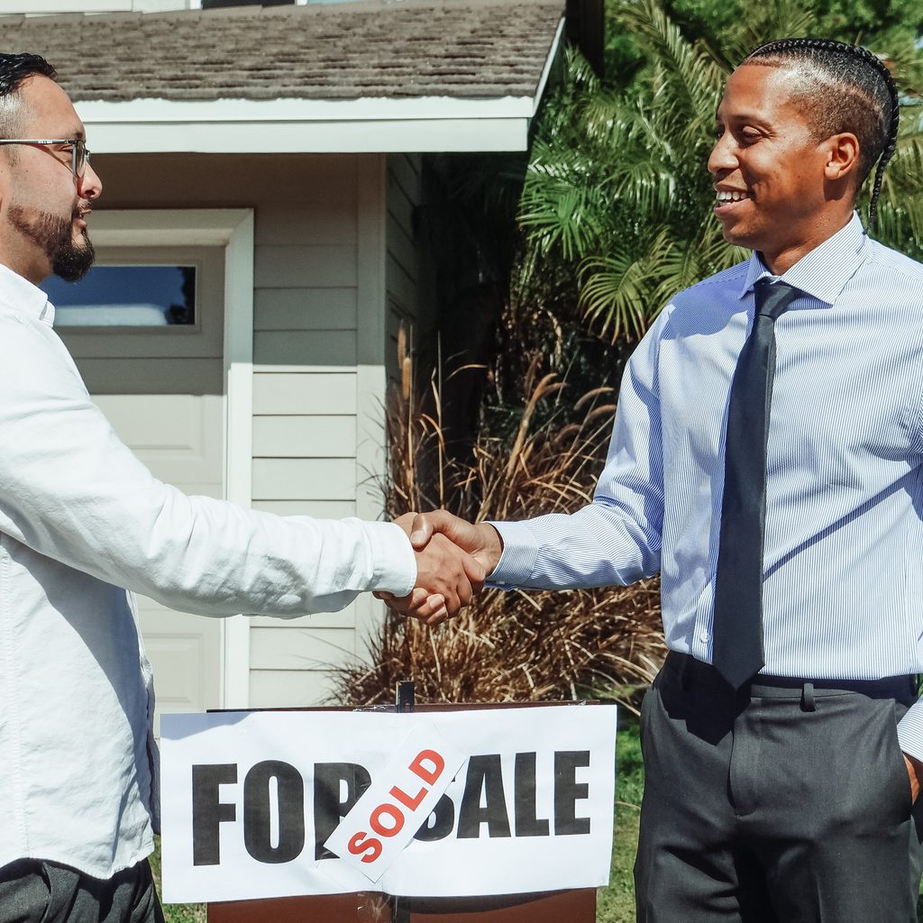 Men making a home deal