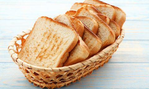 Toasted bread in wicker basket