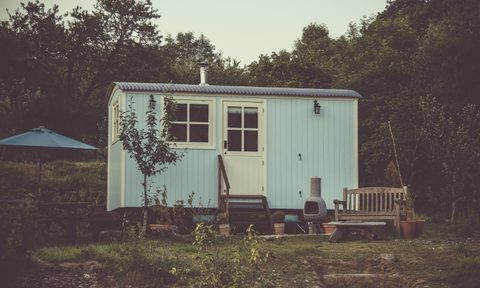 Tiny blue home in the country
