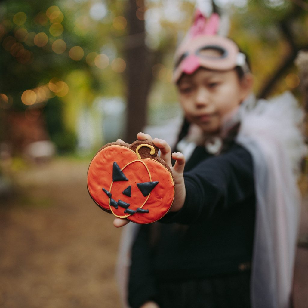 Asian kid going trick-or-treating