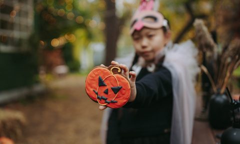 Asian kid going trick-or-treating