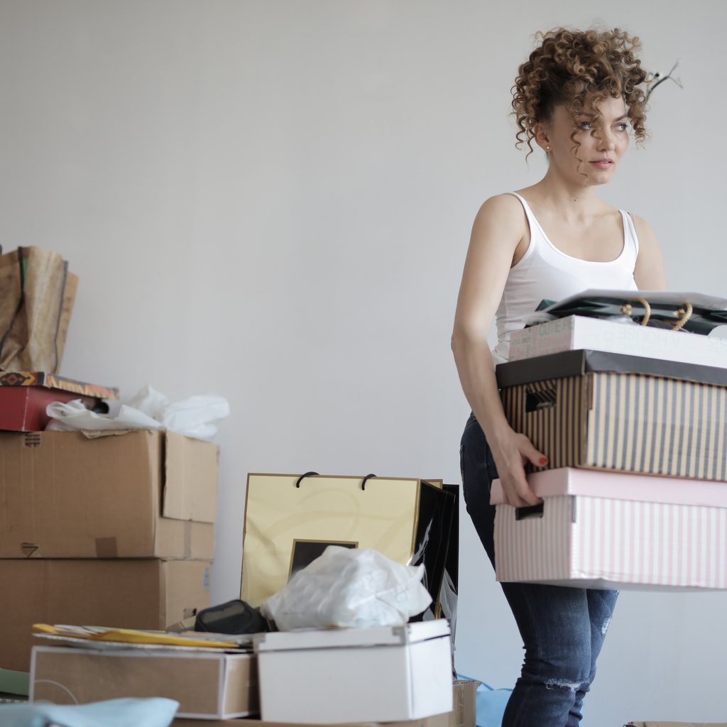 Woman decluttering her house