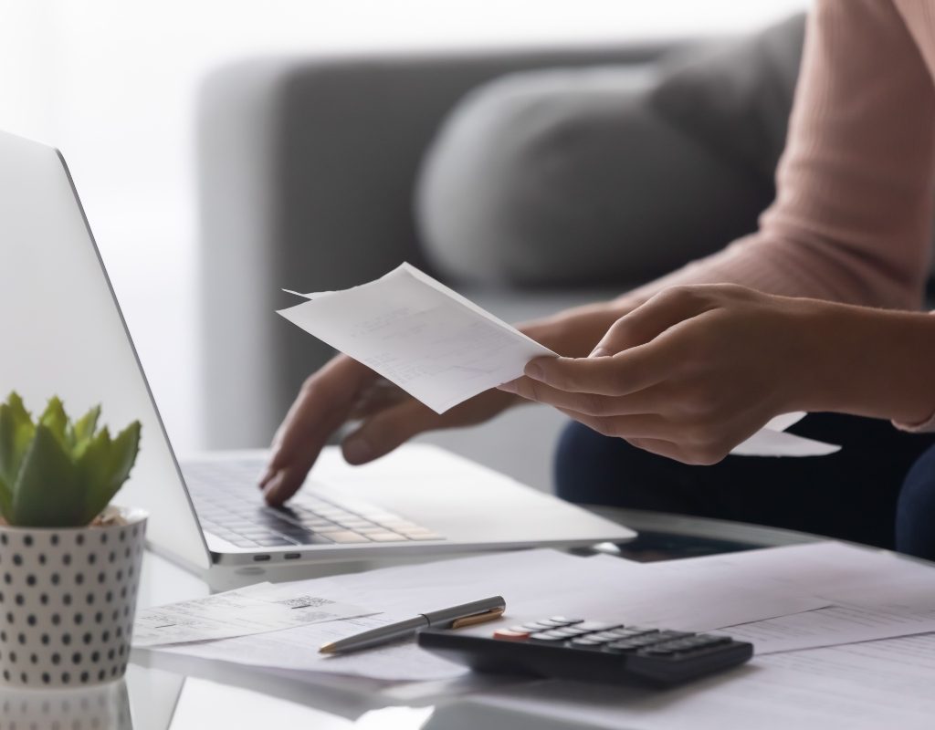 woman saving her receipts digitally