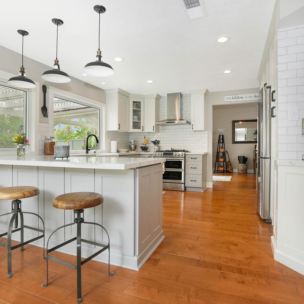 modern farmhouse kitchen with bright hardwood floors