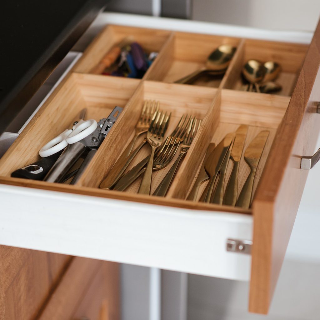 silverware drawer with gold flatware