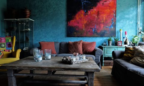 blue walls in a maximalist living room