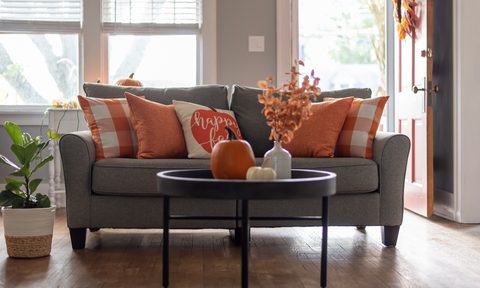 Fall home in the living room with pumpkinssdecor-couch
