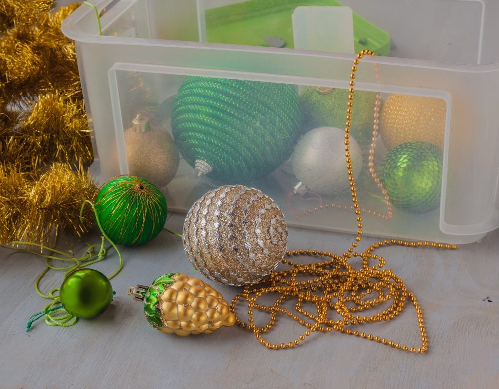 Christmas decorations in a storage bin