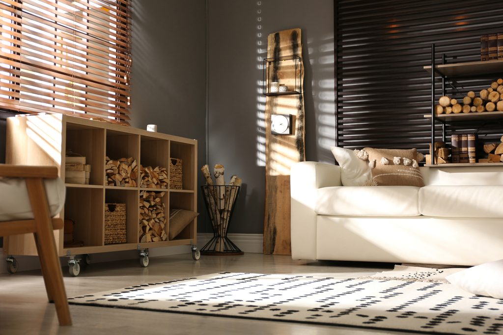 rustic living room design with firewood on shelf