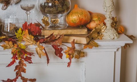 fall foliage on fireplace mantel