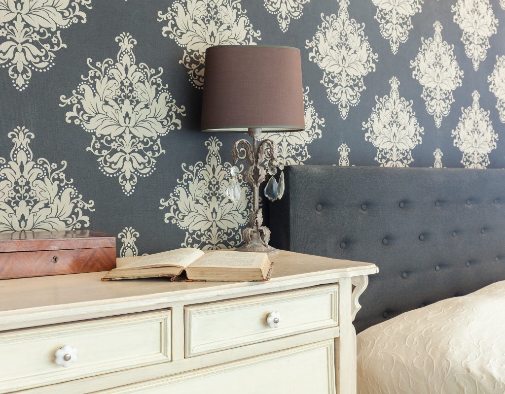 Blue and white vintage wallpaper in bedroom