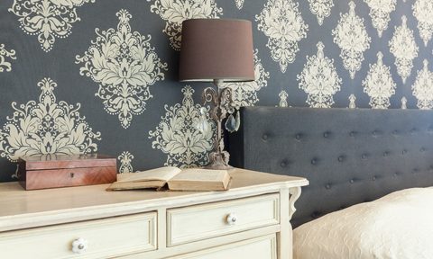 Blue and white vintage wallpaper in bedroom