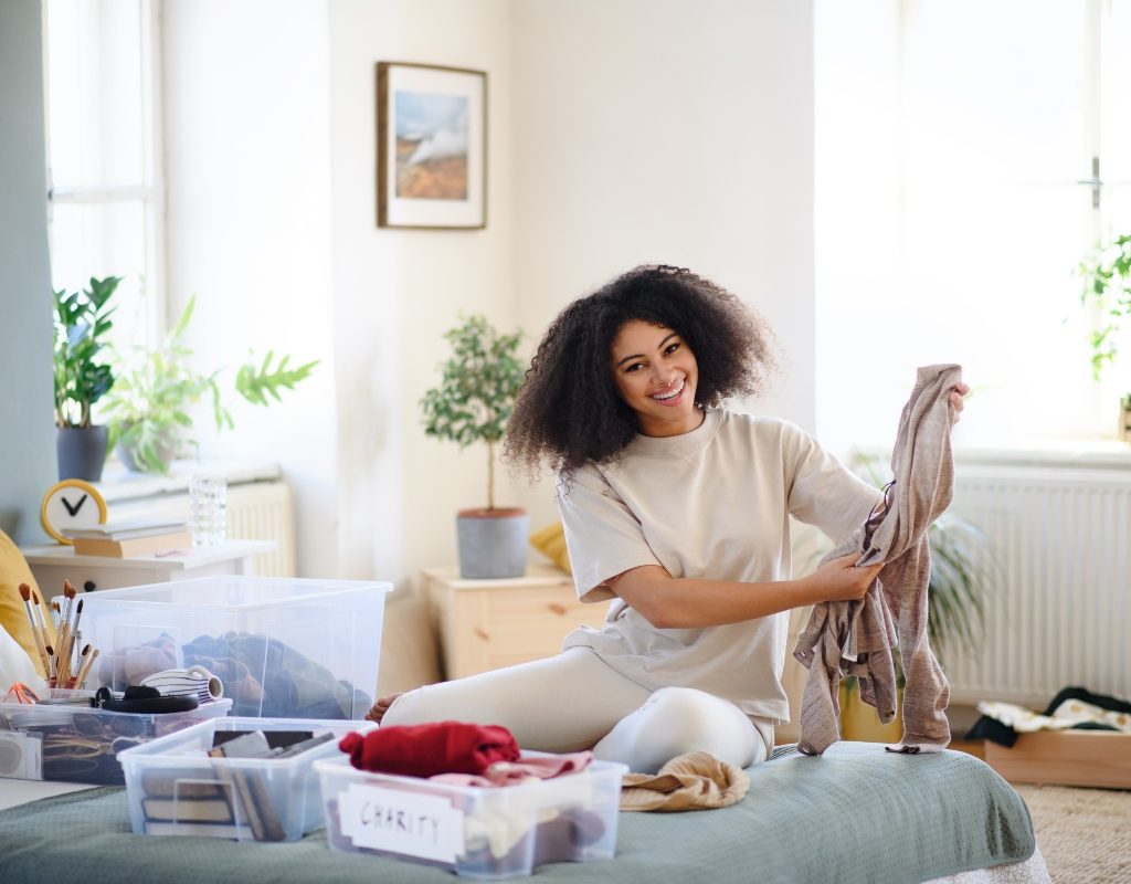 Woman organizing her summer clothing