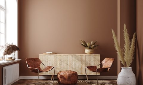 bohemian styled room with warm wall paint color