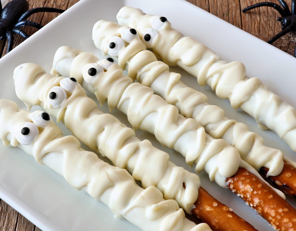 White chocolate dipped mummy pretzel rods