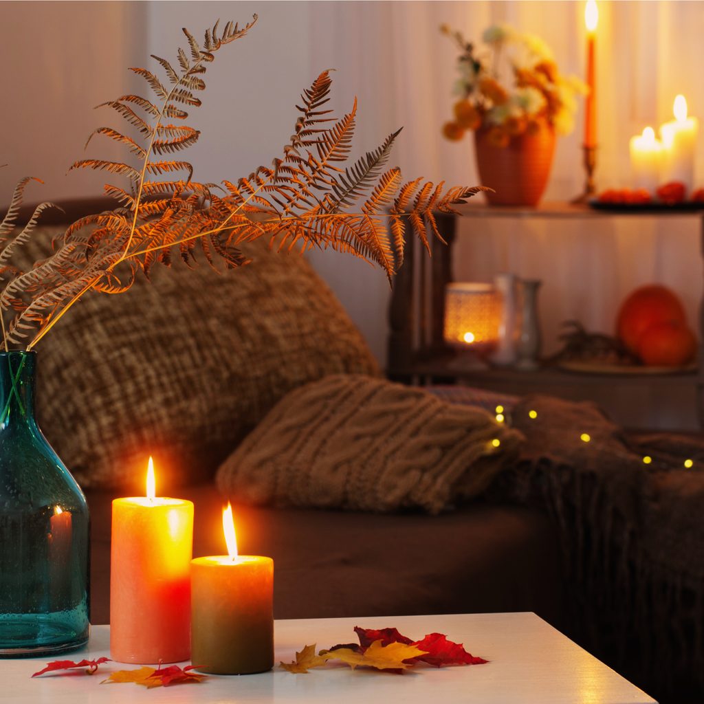 Fall decor with a blue vase