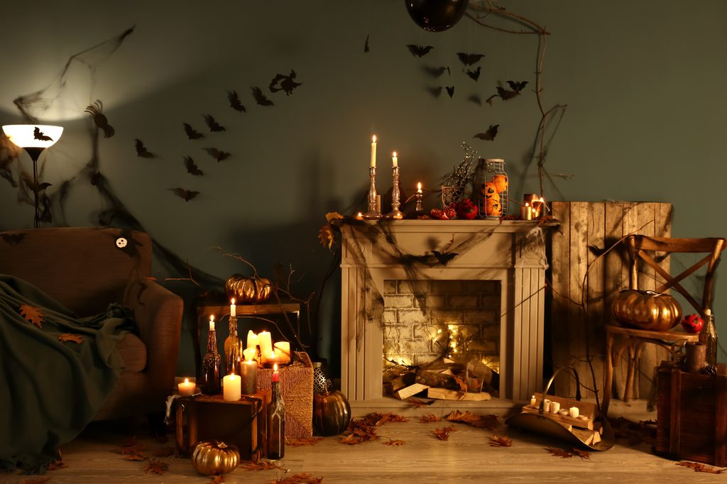 halloween decorations in room with fireplace