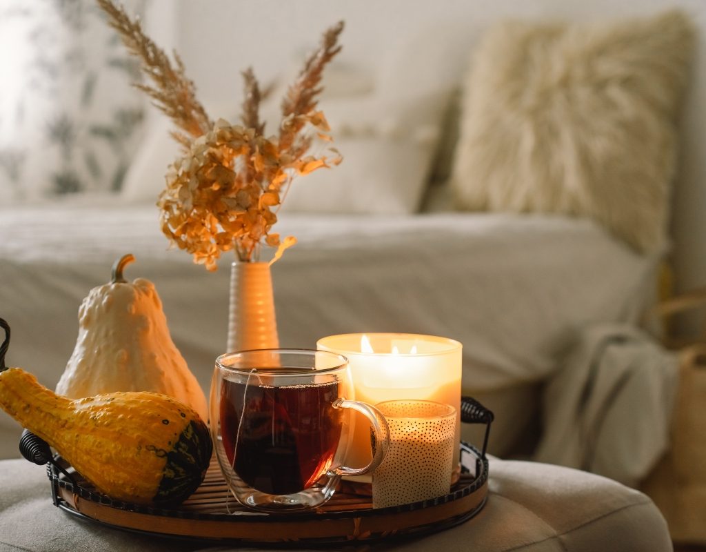 Hygge fall decor with candle and tray