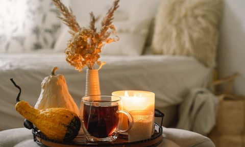 Hygge fall decor with candle and tray