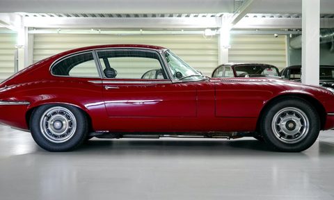 red classic car in garage
